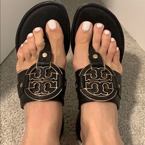 Tory Burch black with gold emblem sandals